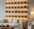 Floating wooden shelves with warm LED accent light showcasing a collection of Jian Zhan Tenmoku tea cups with oil spot glaze patterns in a cozy living room