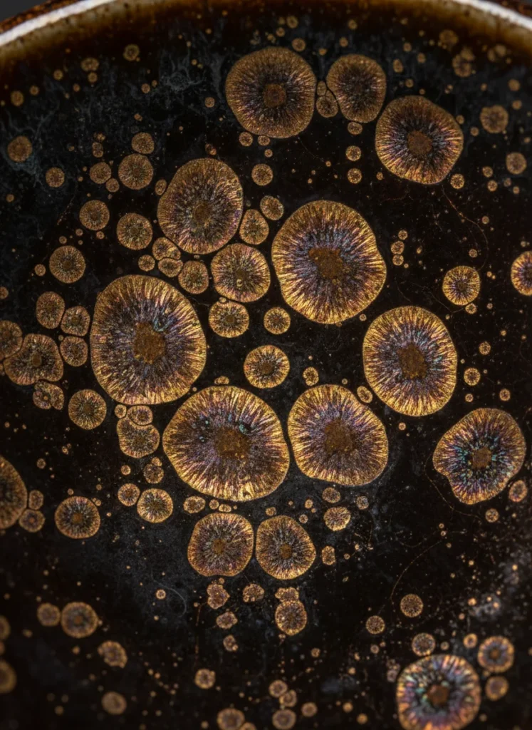 How Tenmoku Tea Cups Change Color Over Time 4 Macro detail of golden oil spot crystalline surface