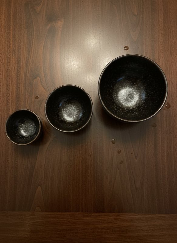 Three tenmoku cups in small medium large sizes Three tenmoku cups in small medium large sizes