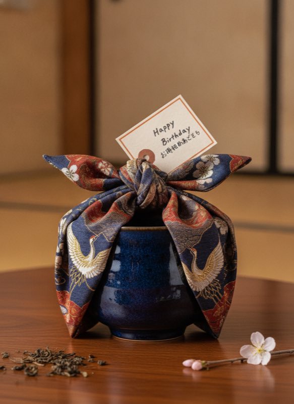 Tenmoku tea cup gift wrapped in furoshiki cloth