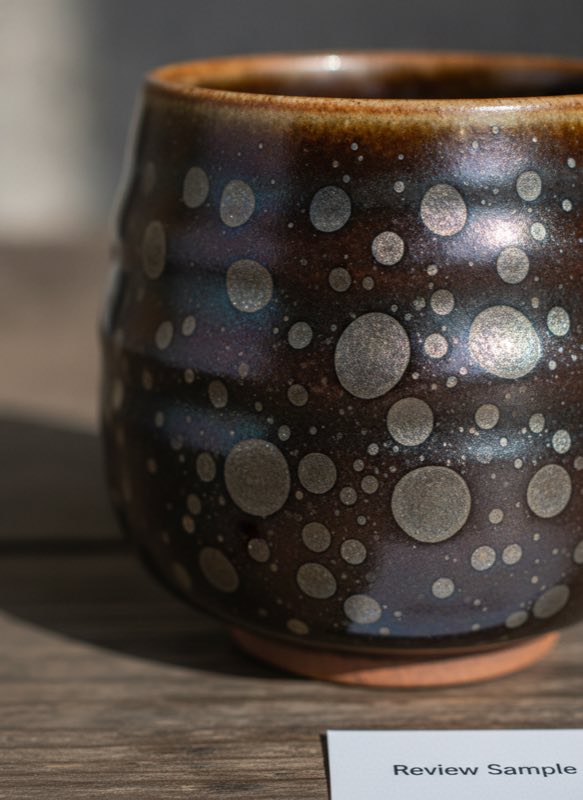 Oil-spot glaze detail Close-up of tenmoku oil-spot glaze detail in review photo