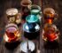 Six tea vessels temperature test with thermometer on dark table